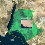 Engineers performing civil and survey work at the NEOM Al Khuribah project site using surveying equipment.